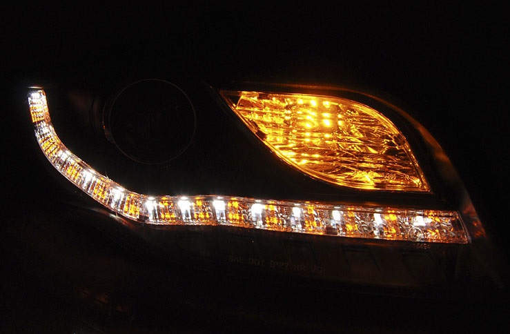 Phares Audi A4 B7 Yeux du Diable Dayline noire ELR